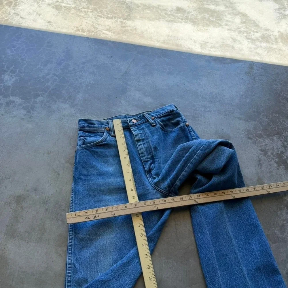 Vintage 90's Wrangler made in USA cowboy cut faded denim straight jeans 28x32